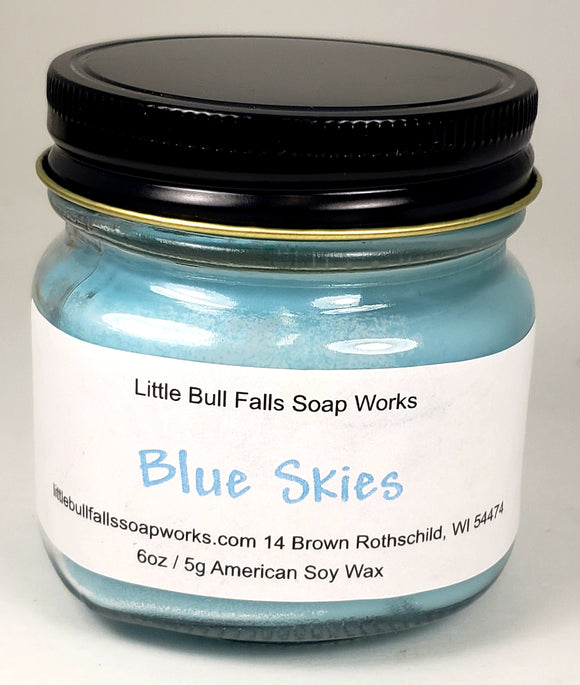 Blue Skies soy wax candle made in Wisconsin by Little Bull Falls Soap Works. Blue candle smells like a happy spring day. Spring summer candle.