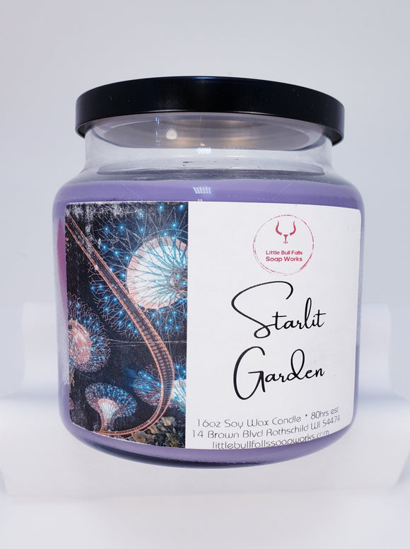 Starlit Garden is a soy wax candle with a wooden wick handmade by Little Bull Falls Soap Works. A summer night in garden in full bloom dotted with twinkling white lights. A bold, mysterious blend of white blossoms, Turkish rose, neroli and moonflowers. Highlighted with hints of wild lilac, white musk and warm sandalwood.
