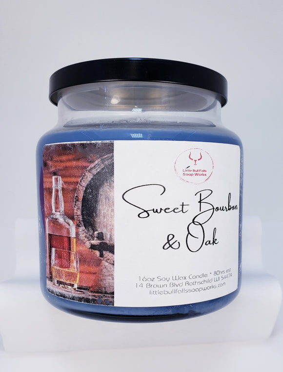 Sweet Bourbon & Oak wood wick soy wax candle. Handmade by Little Bull Falls Soap WOrks. A complex, luxurious aroma full of sophistication and class. Warm, rich vanilla bourbon, italian bergamot and heliotrope blend elegantly with decadent leather and black amber crystals all on a base of spicy, woodsy oak reserves.